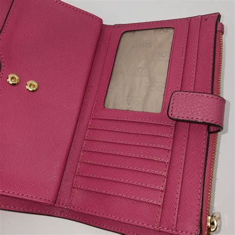 michael kors electric pink wallet|Michael Kors pink wristlet wallet.